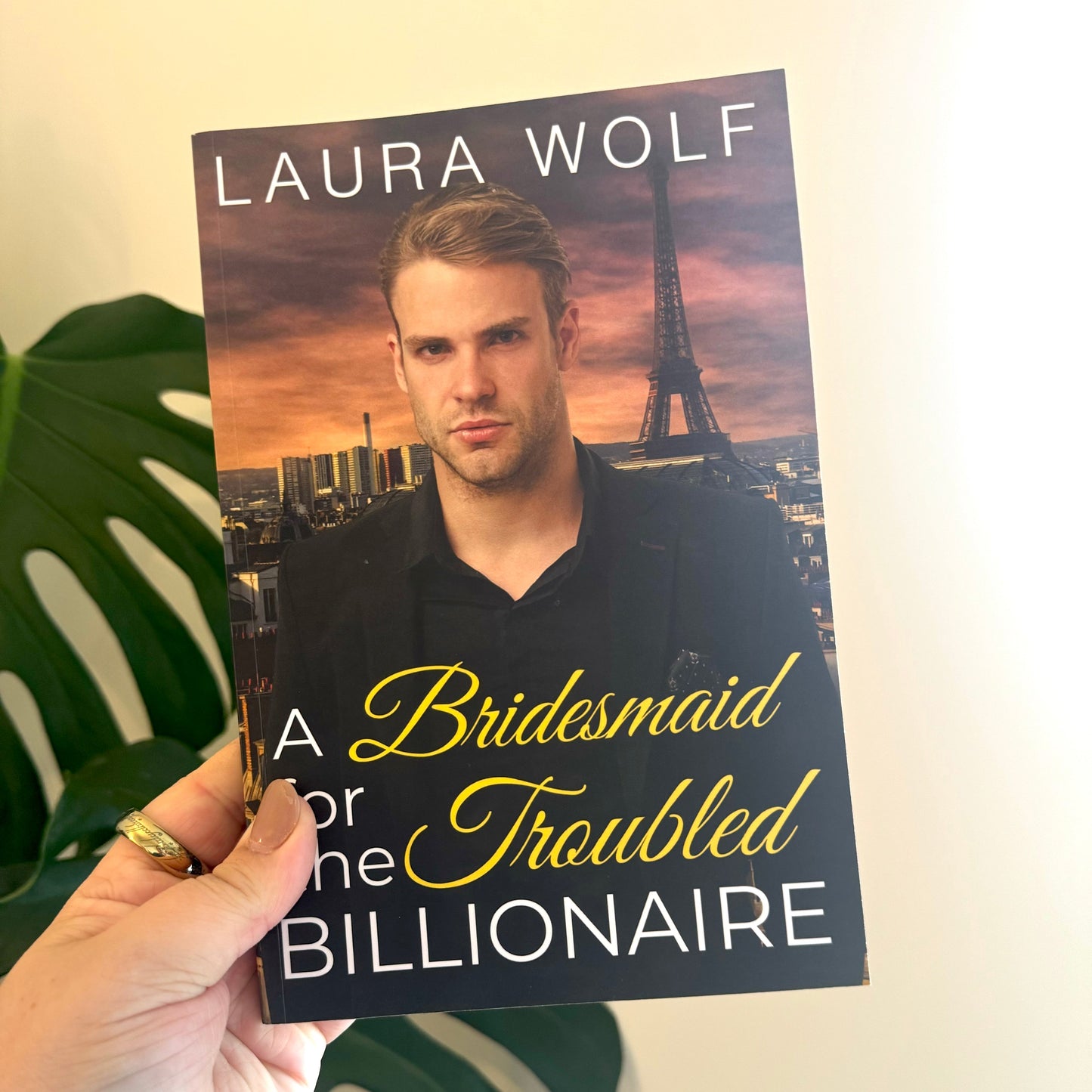 a bridesmaid for the troubled billionaire - laura wolf - pae pukapuka